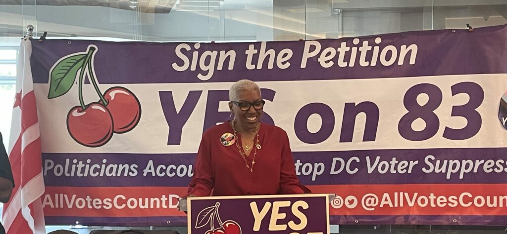 Lisa D. T. Rice speaking at a press conference before turning in petitions for Initiative 83