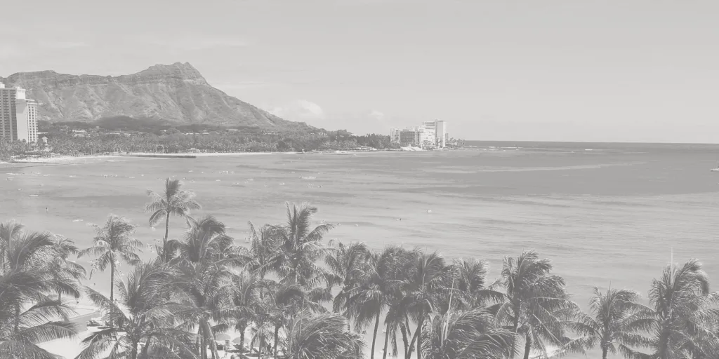 Photo of a beach, bay, and mountains in Honolulu, Hawaii